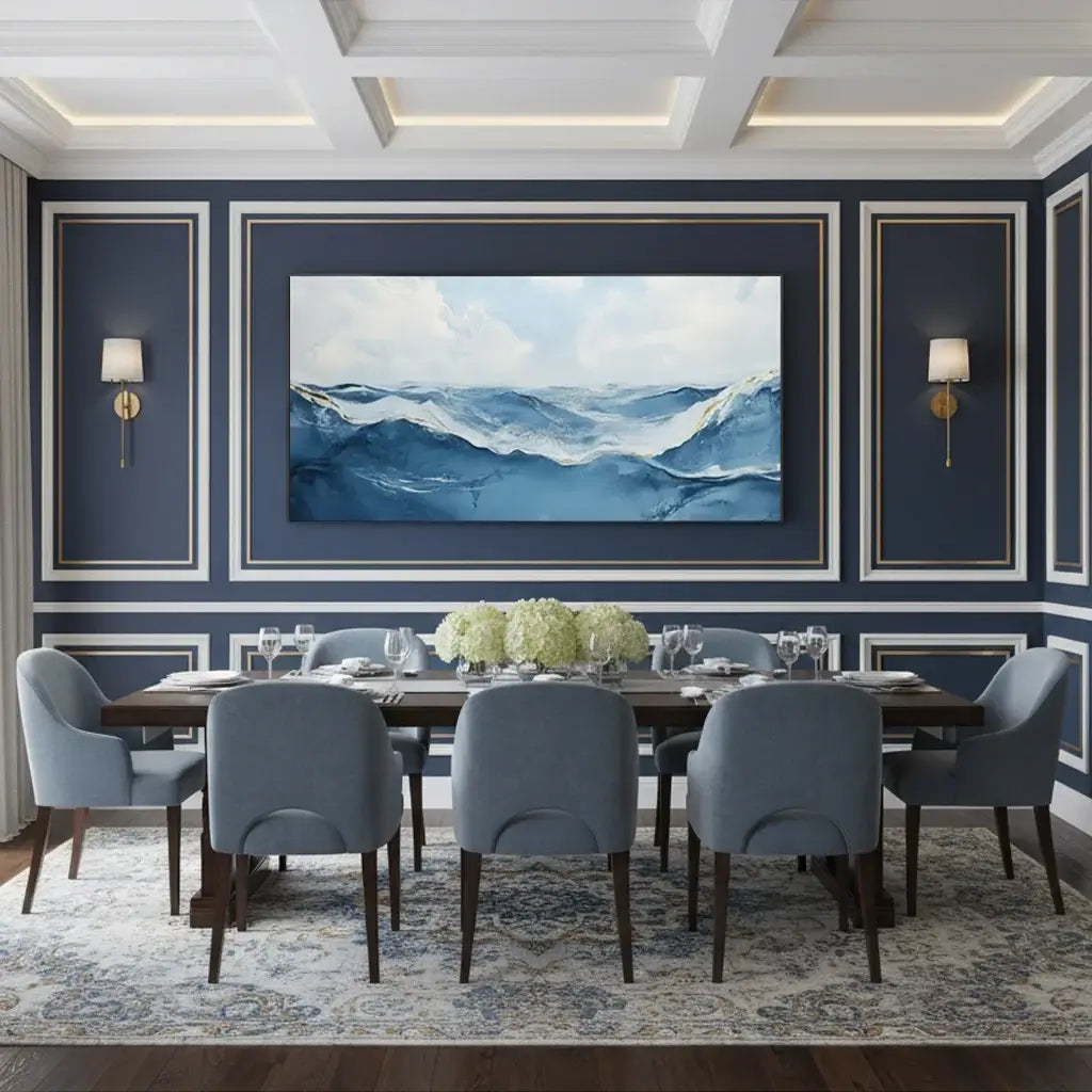 Dining room with blue walls, a large ocean painting, and gray chairs.