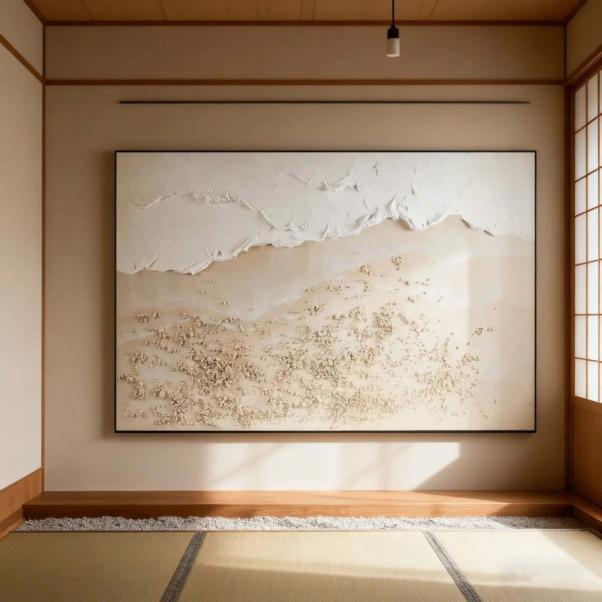 Abstract landscape painting on a wall in a room with wooden flooring and sliding doors.