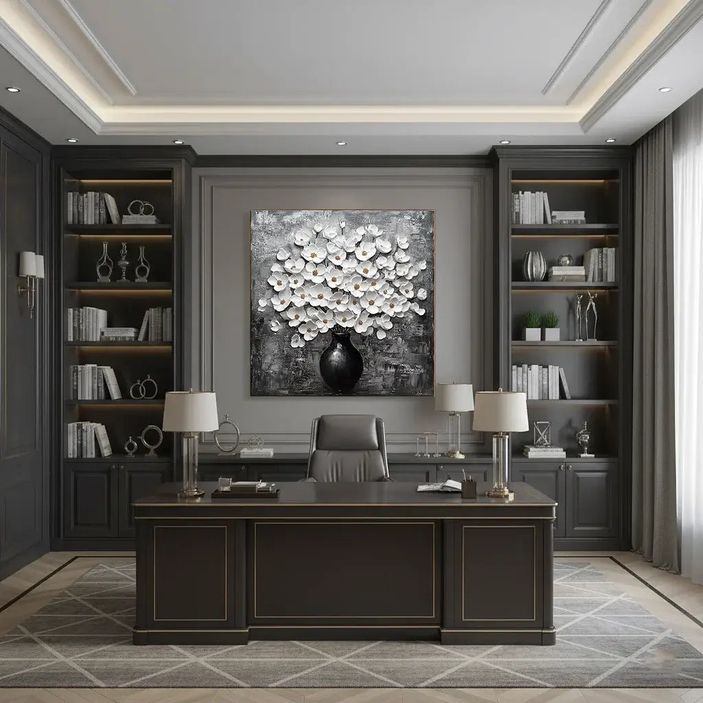 Modern office interior with a desk, bookshelves, and wall art.