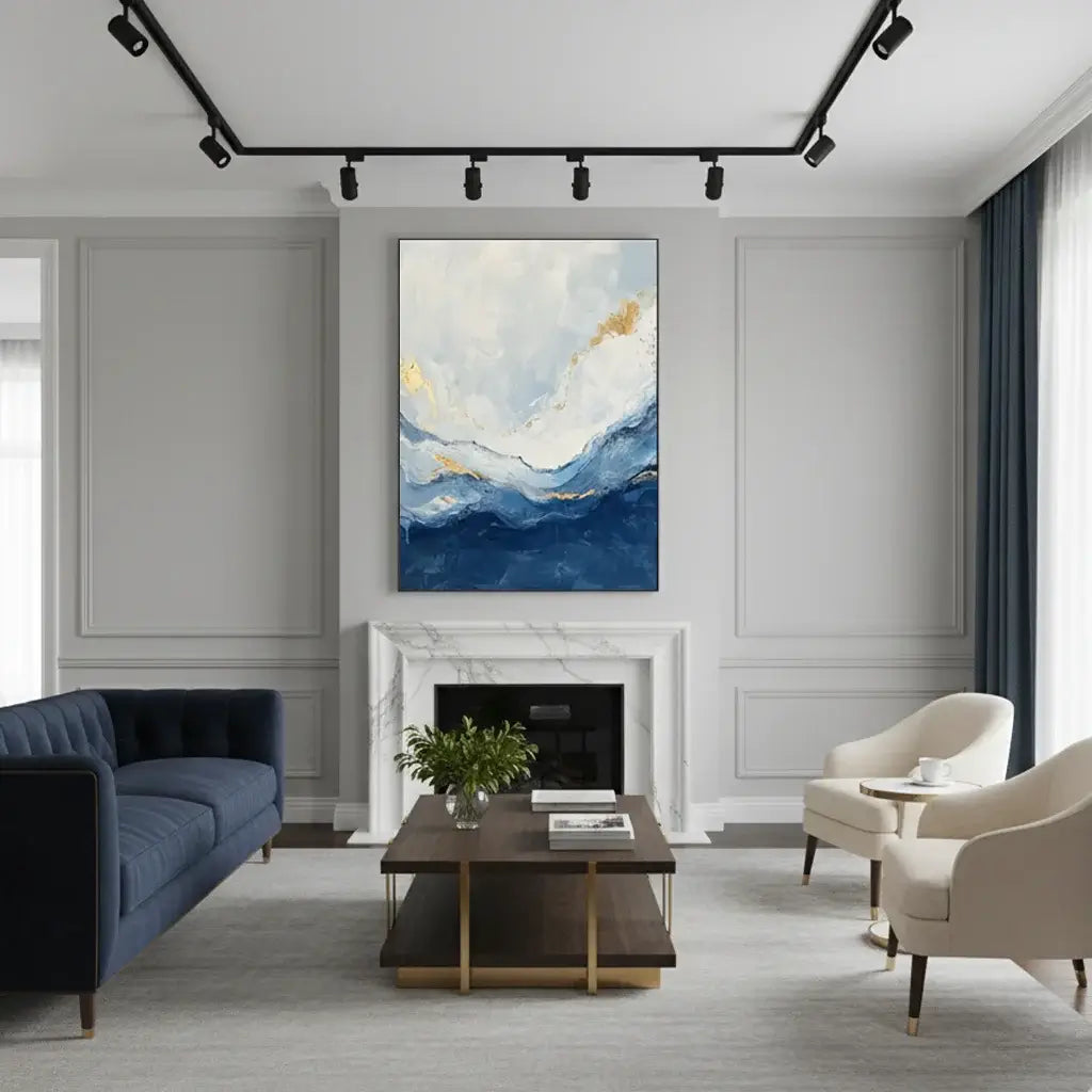 Modern living room with a blue sofa, coffee table, and abstract painting above a fireplace.