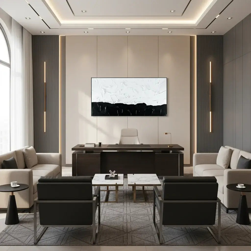 Modern office interior with a large desk, chairs, and wall art.