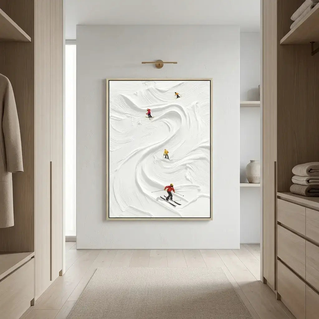 Framed artwork of skiers on a white background in a modern interior setting.