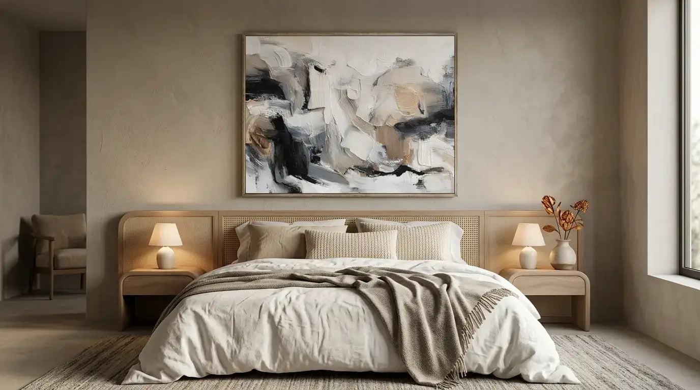 Modern bedroom with abstract painting above bed