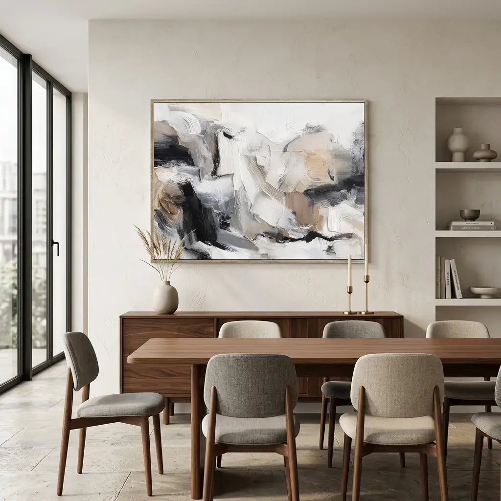 Dining room with wooden table and chairs, abstract painting on the wall, and shelves with decor items.