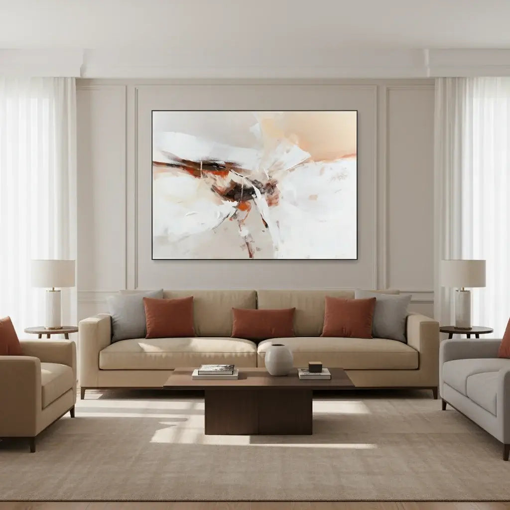 Modern living room with beige sofa, abstract painting, and decorative items.
