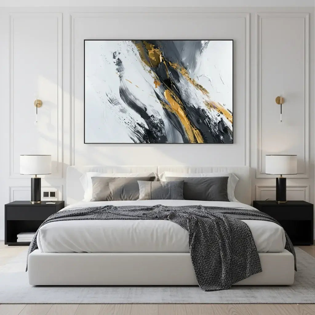 Modern bedroom with a bed, nightstands, and abstract art on the wall.
