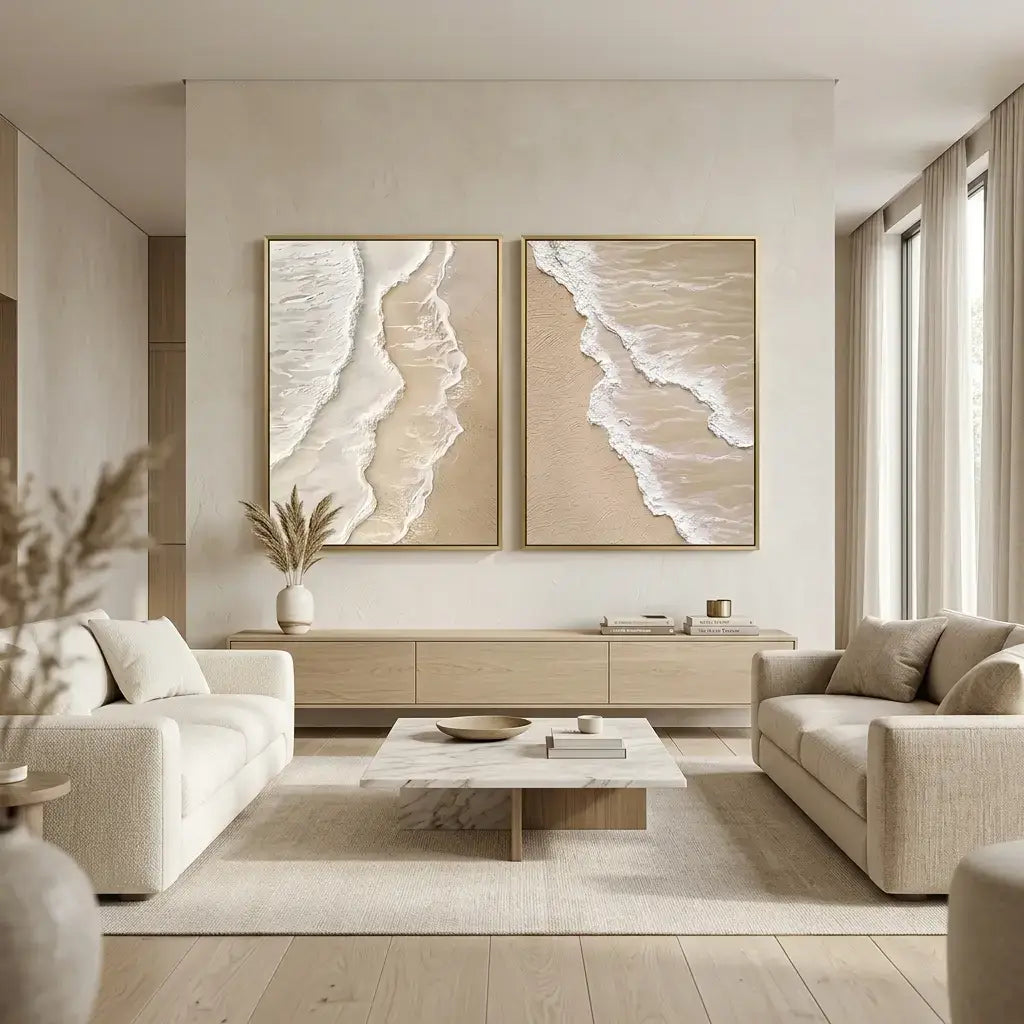 Modern living room with neutral tones, artwork on the wall, and a coffee table.