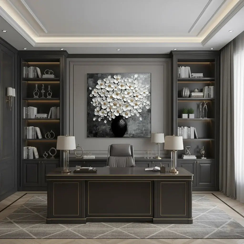 Modern office interior with a dark wooden desk, bookshelves, and a decorative wall piece.