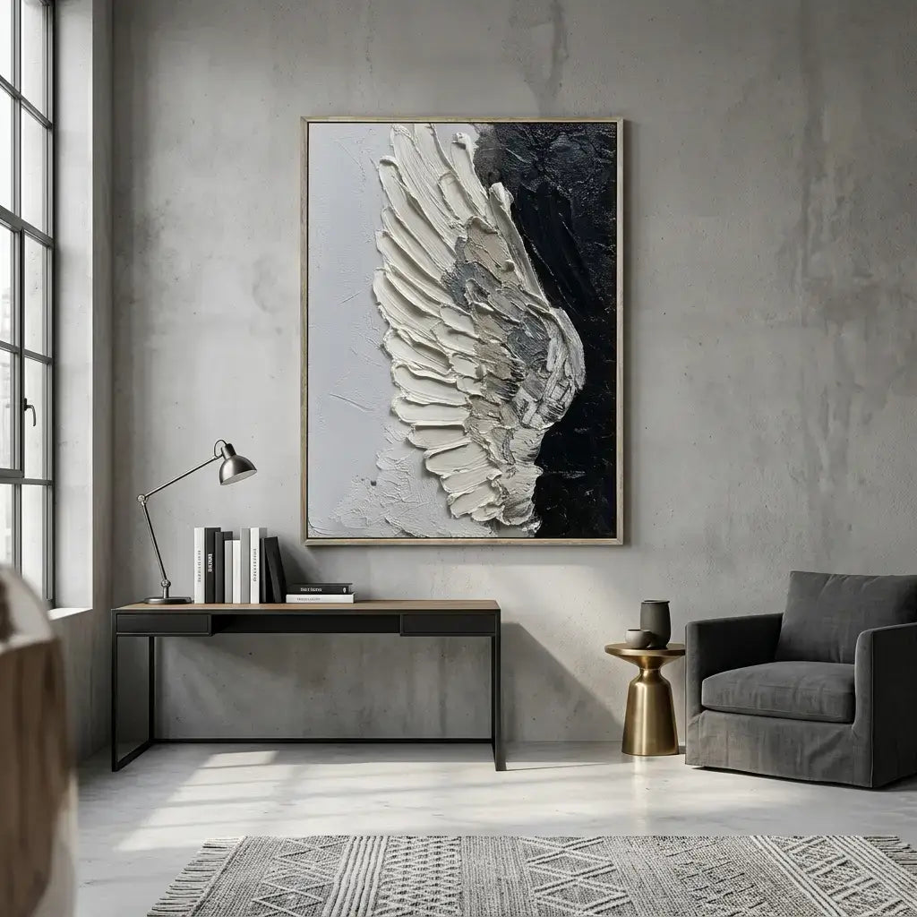 Modern living room with abstract wing artwork on the wall, gray sofa, and side table.