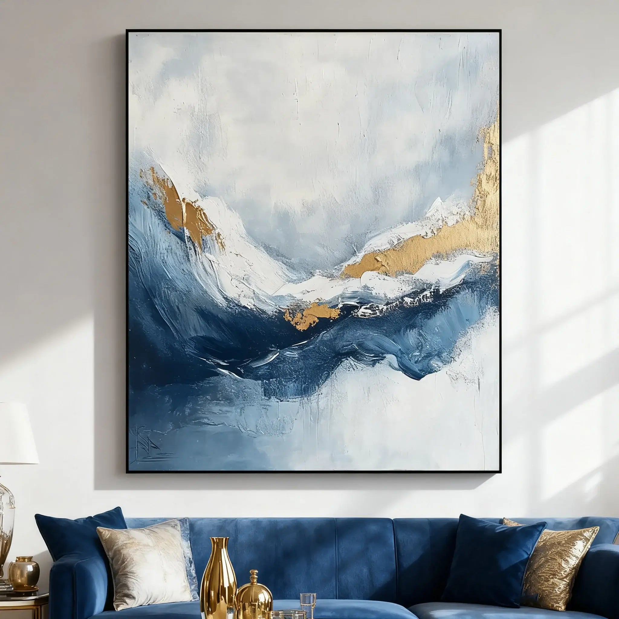 Abstract painting with blue and gold tones in a living room setting.