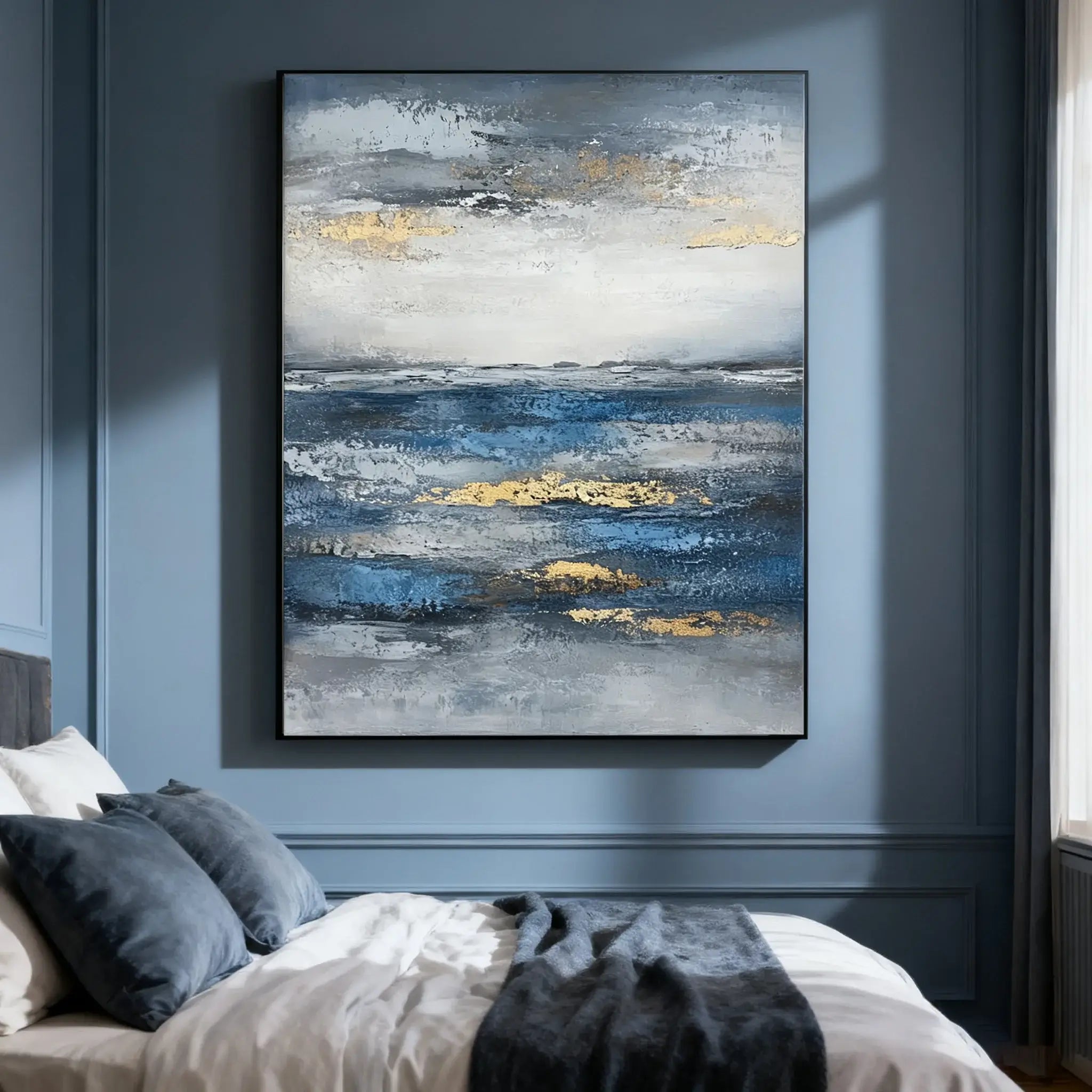 Abstract painting on a wall above a bed with blue and gray tones