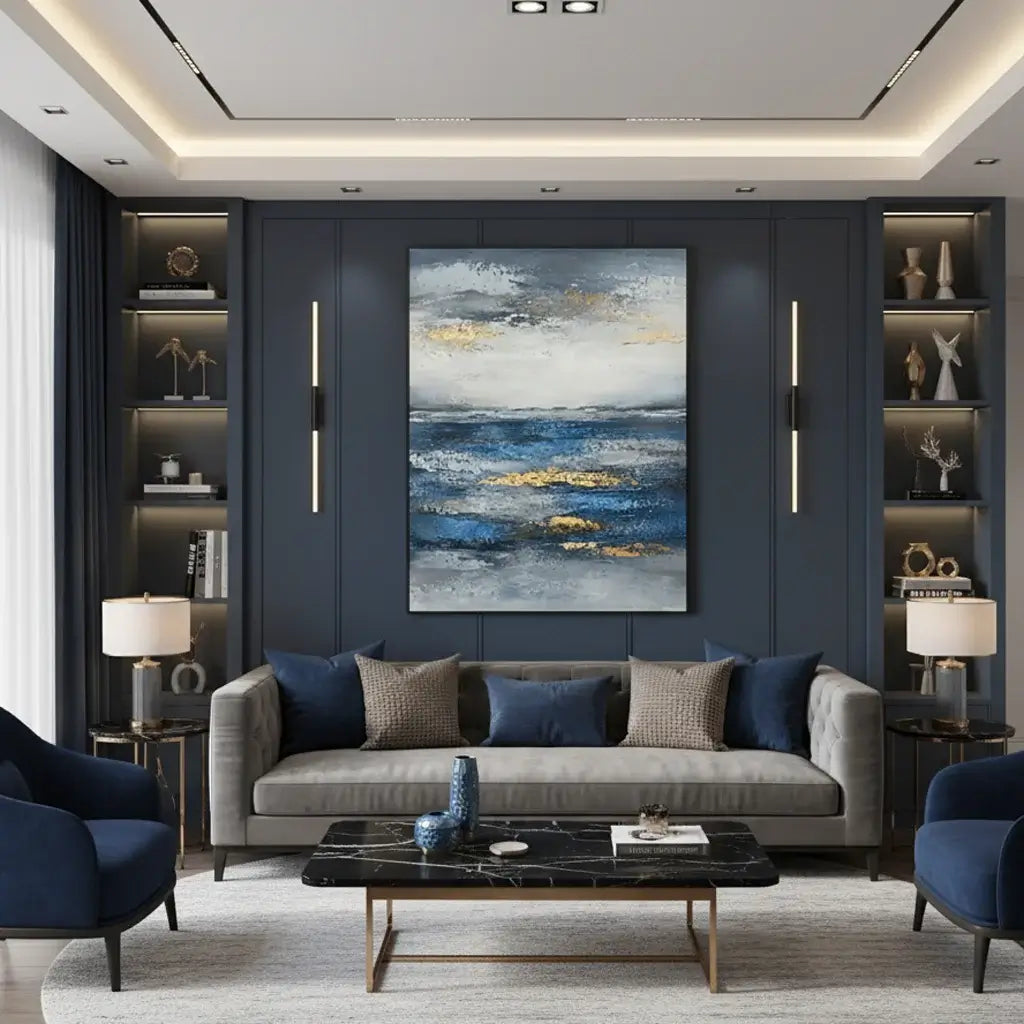 Modern living room with gray sofa, blue armchairs, and abstract painting on wall.