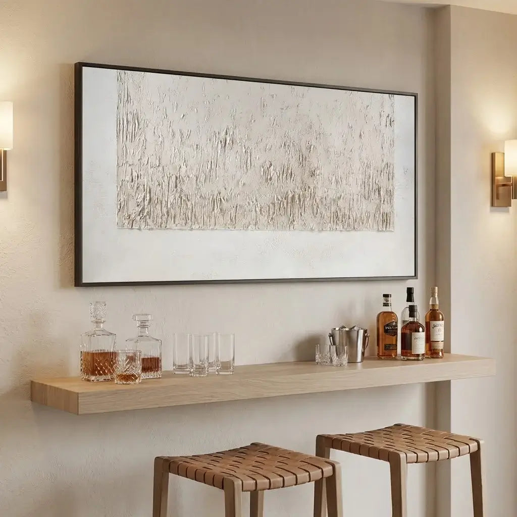 Modern bar setup with wooden shelf, stools, and abstract painting on a wall.