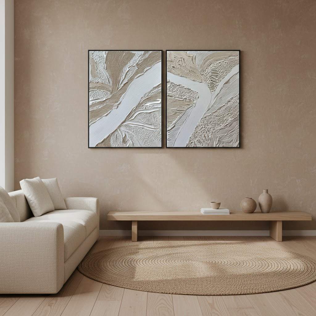 Living room with abstract wall art, beige sofa, and wooden coffee table.