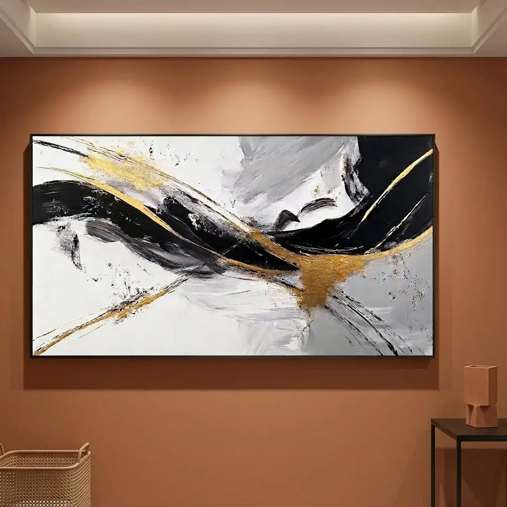 Living room with a gray sofa, wooden coffee table, and abstract painting on the wall.