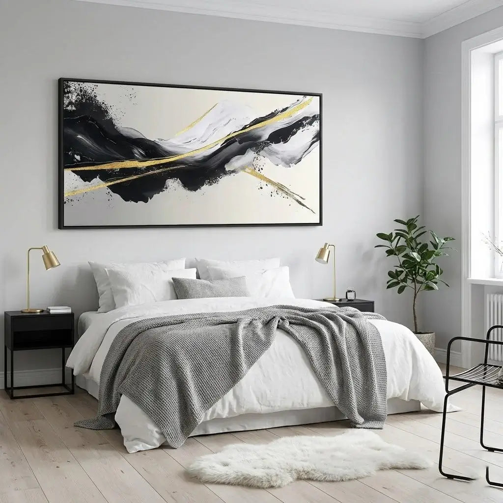 Modern bedroom with abstract art on the wall, bed, and side tables.