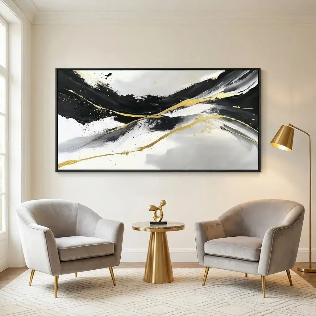 Modern living room with abstract art, chairs, and a table.