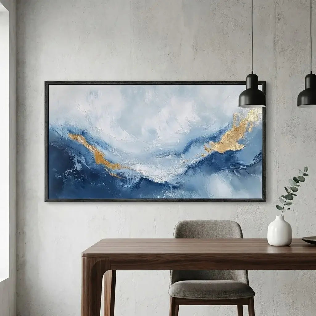Abstract painting with blue and gold tones in a modern interior setting.