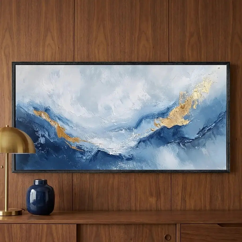 Abstract painting with blue and gold tones on a wooden wall
