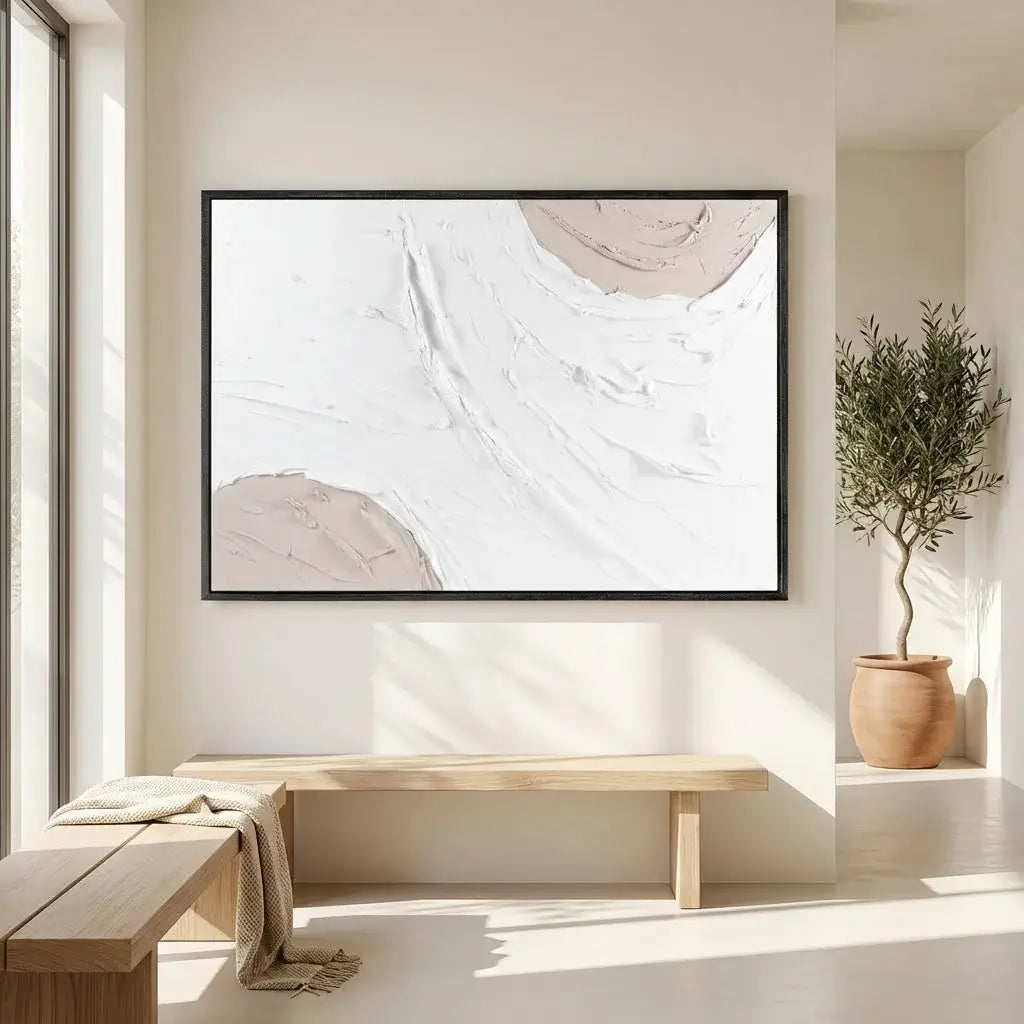 Modern interior with abstract art, wooden bench, and potted plant.