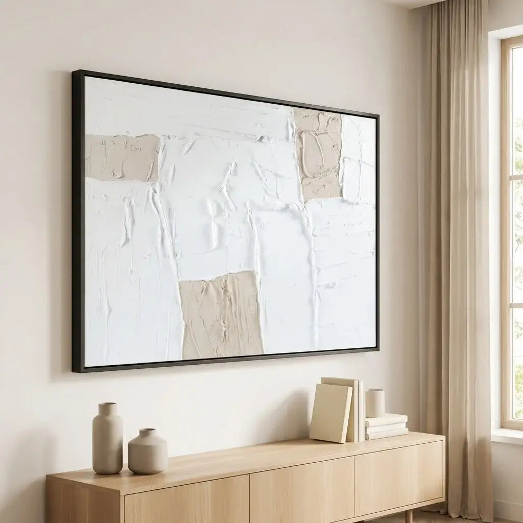 Abstract art piece on a wall above a wooden console table with decorative items.