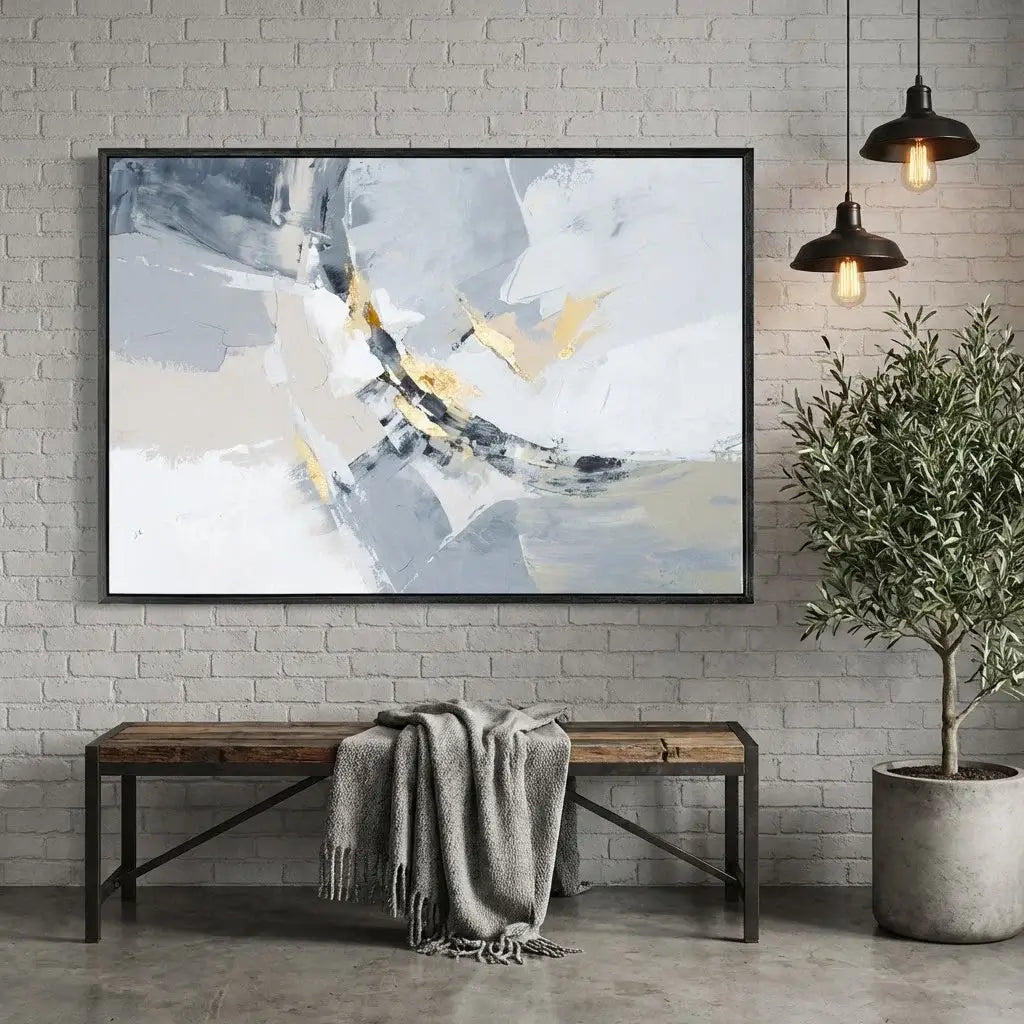 Abstract painting in a modern living room with a bench and plant.
