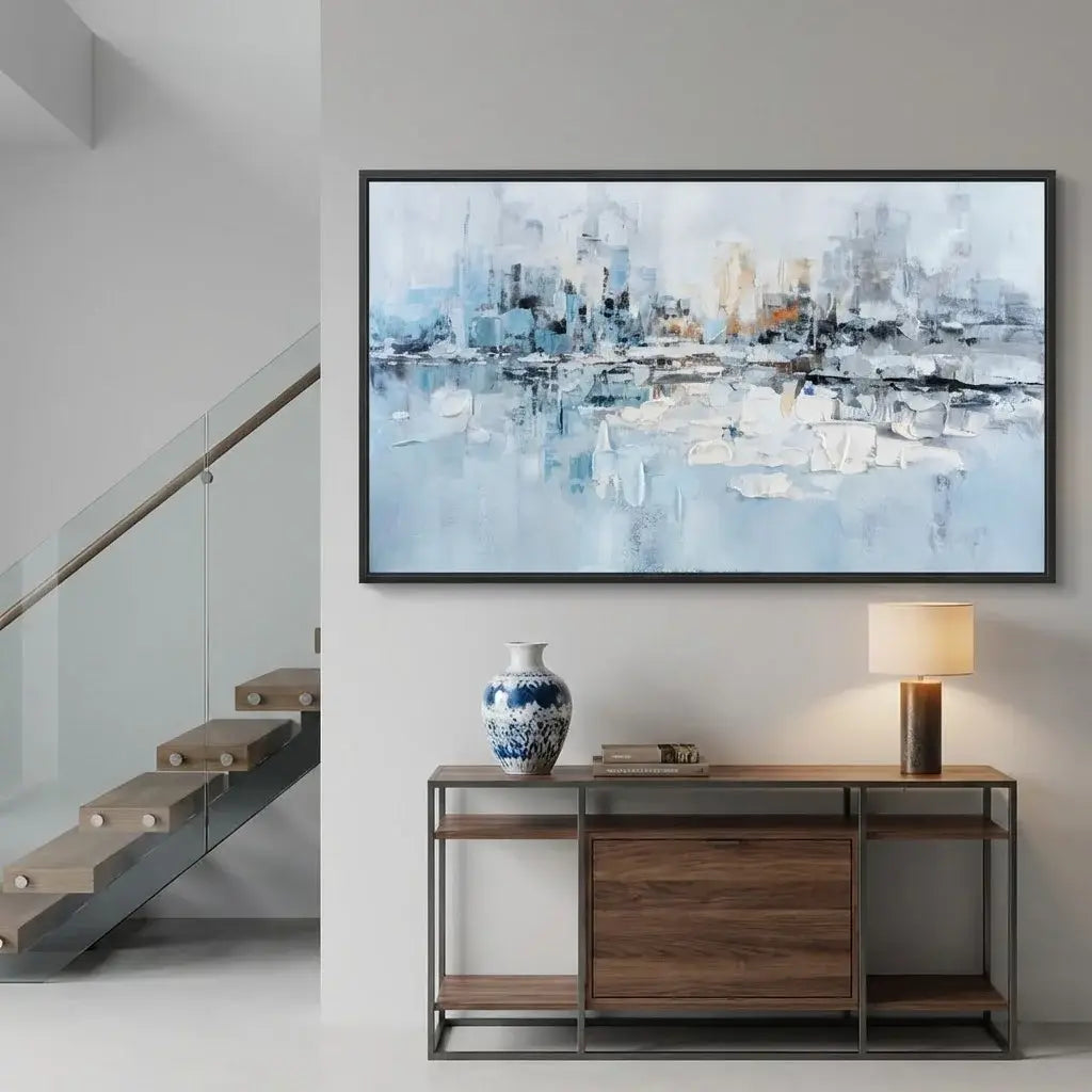 Modern interior with a large abstract painting above a console table.