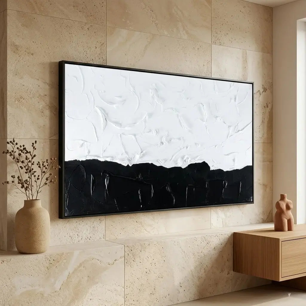 Abstract painting on a wall above a wooden console table in a modern living room.