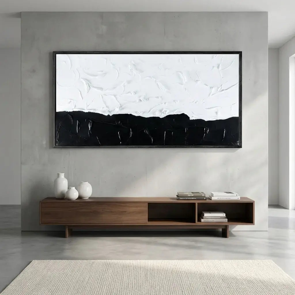 Abstract painting on a wall above a wooden console table in a modern living room.