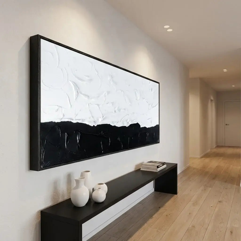 Modern living room with a large abstract painting on the wall and decorative vases on a console table.