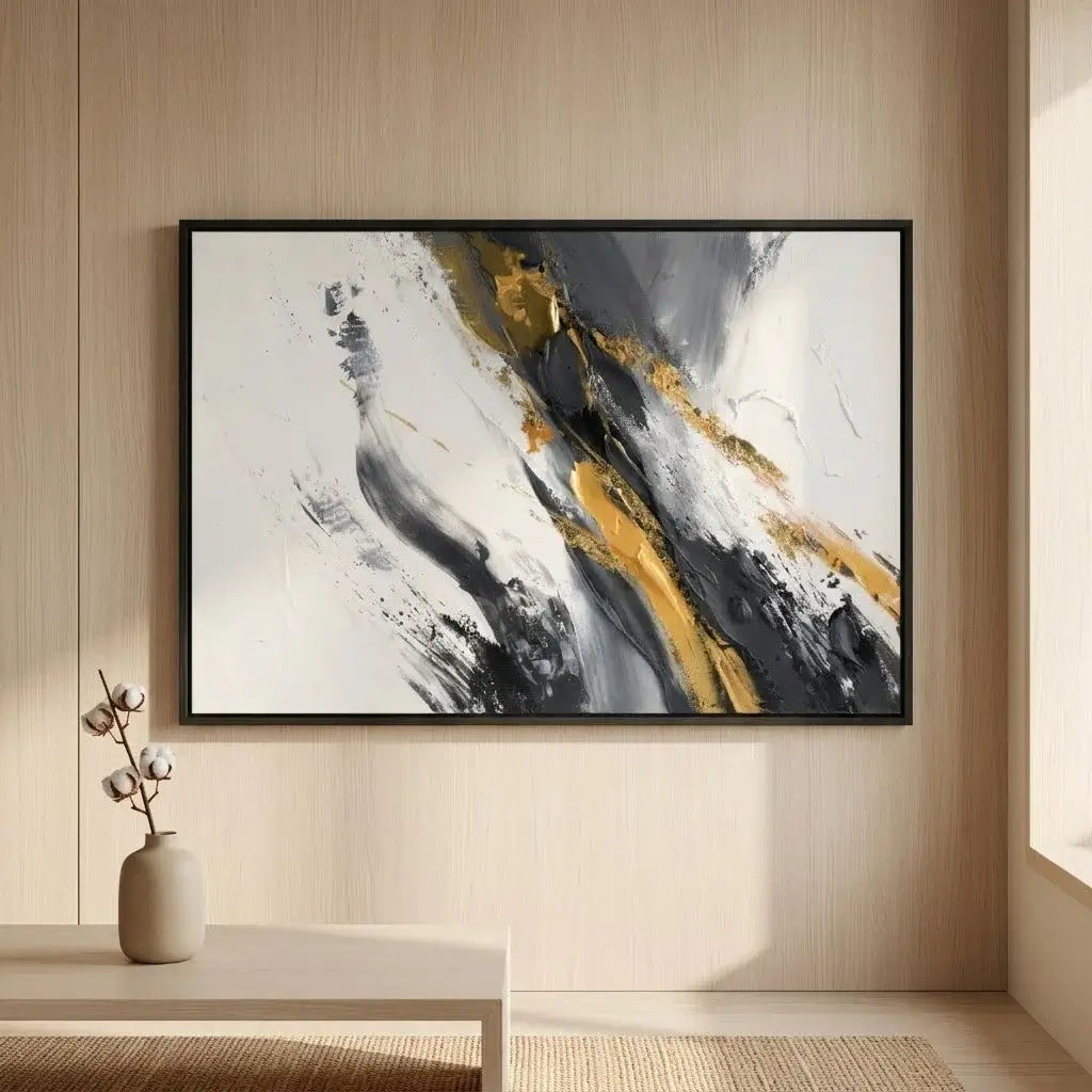 Abstract painting with gold and black accents on a dark wall above a white console table.