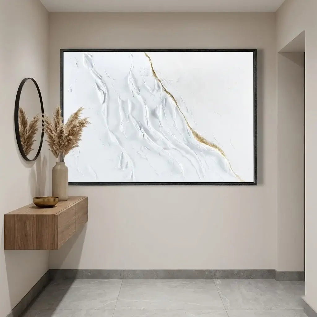 Modern interior with a large abstract painting on the wall, a wooden console table, and decorative elements.