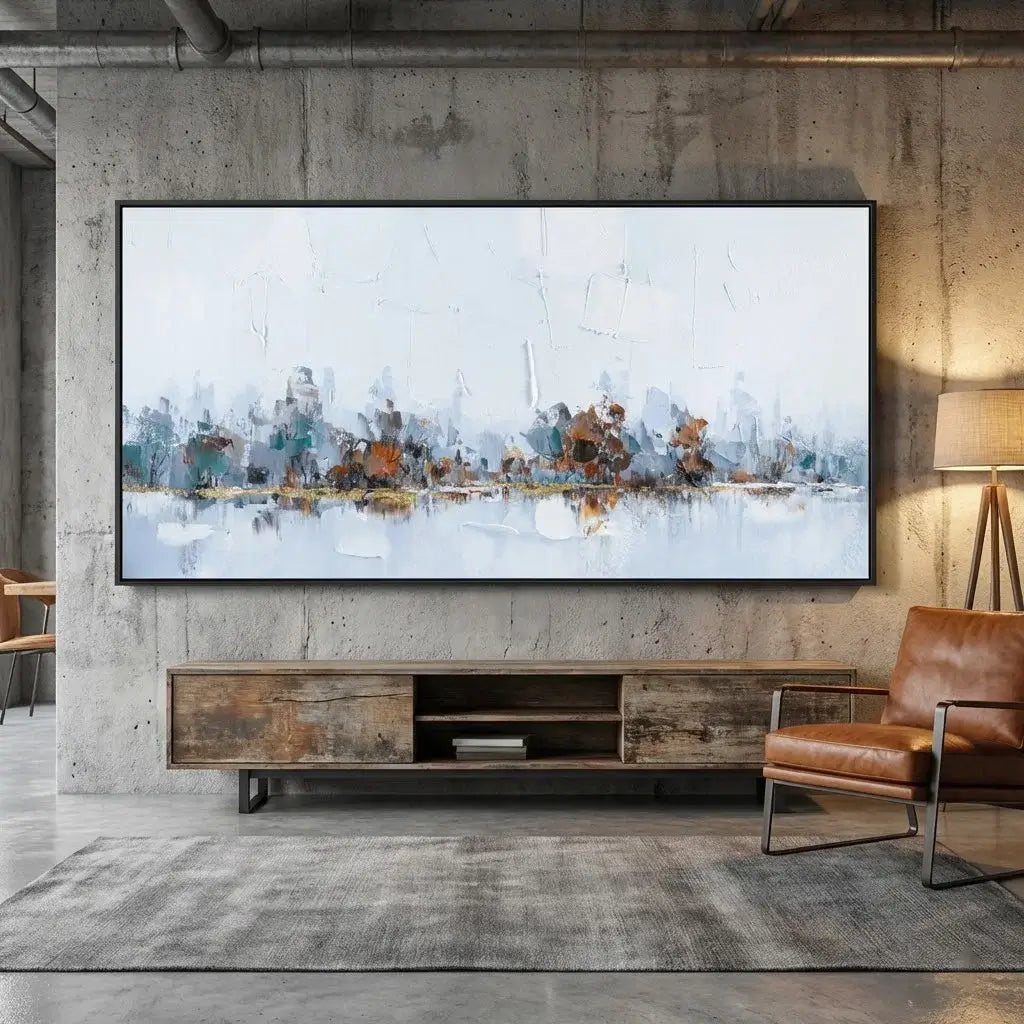 Large flat-screen TV mounted on a concrete wall with a modern interior setting.