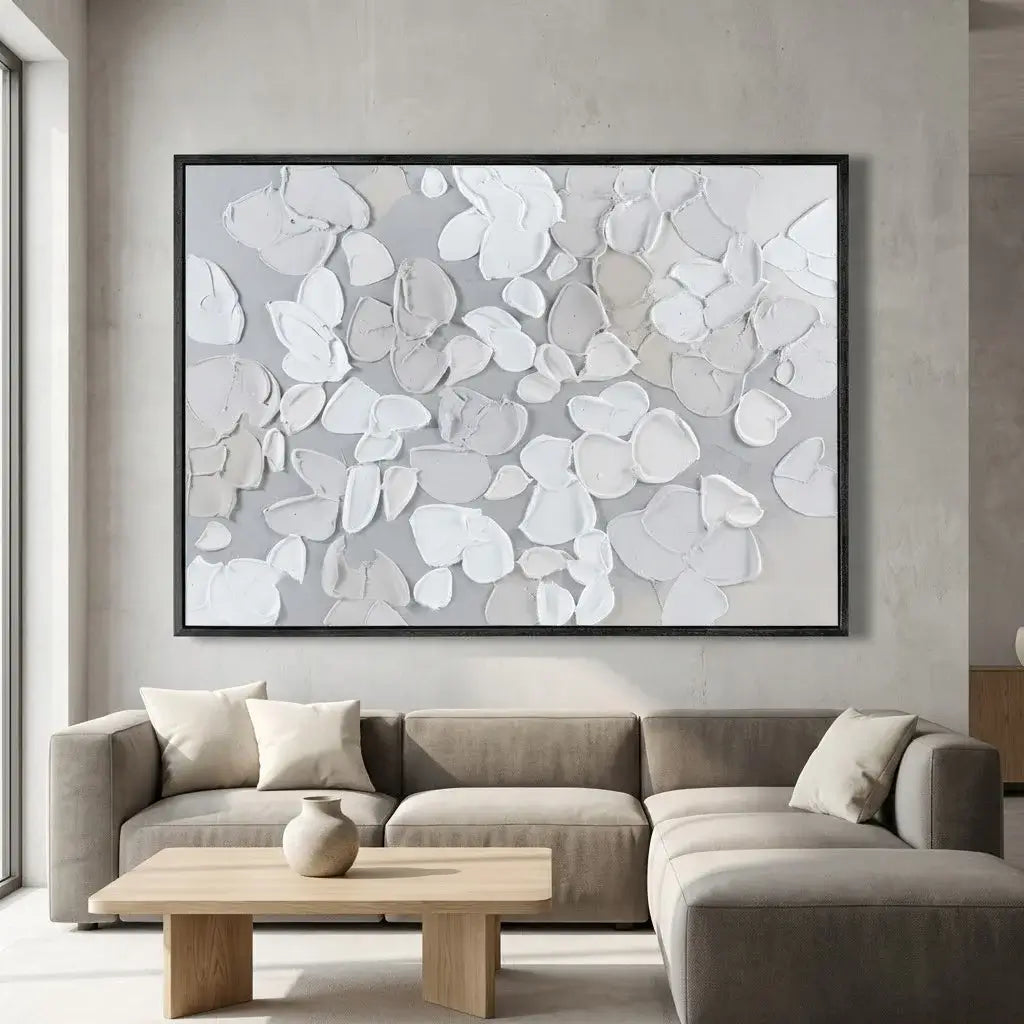 Modern living room with a large abstract art piece on the wall above a sofa.