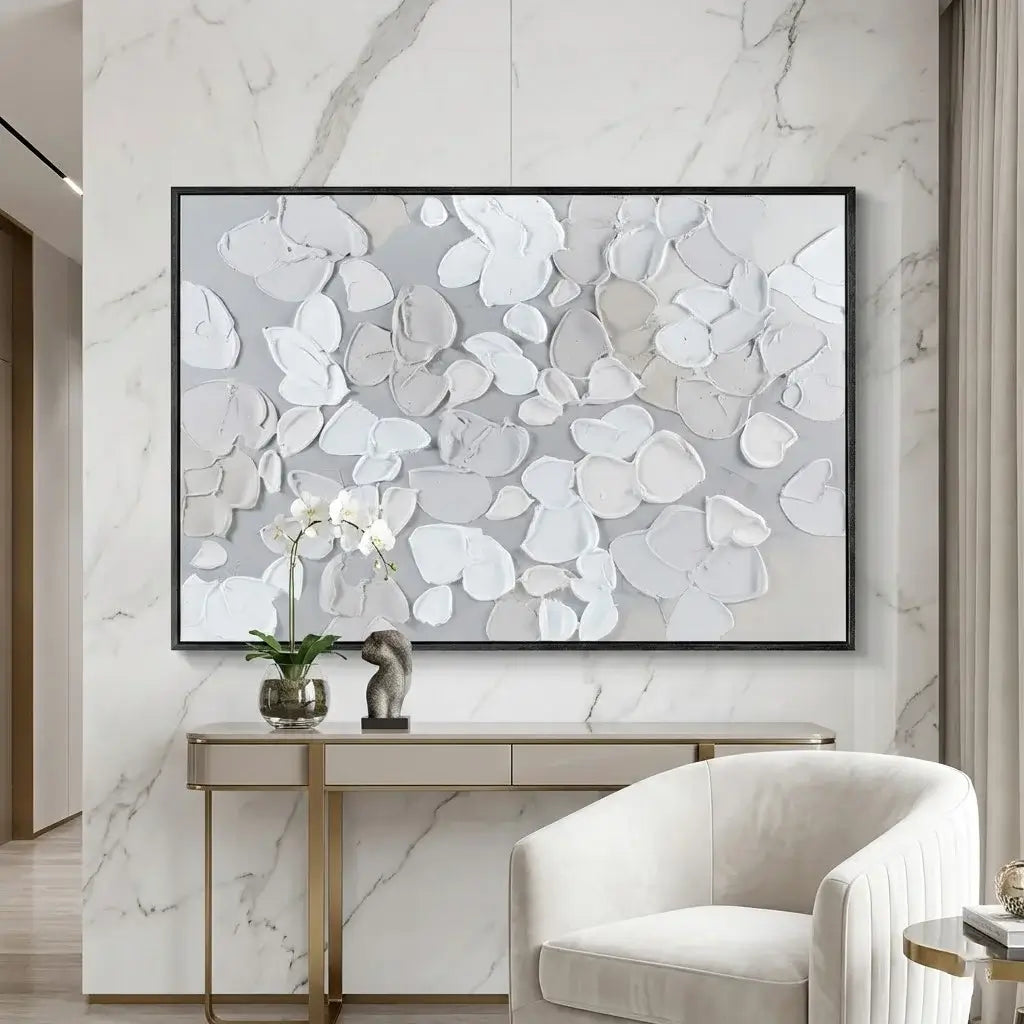 Modern interior with abstract wall art, console table, and chair.