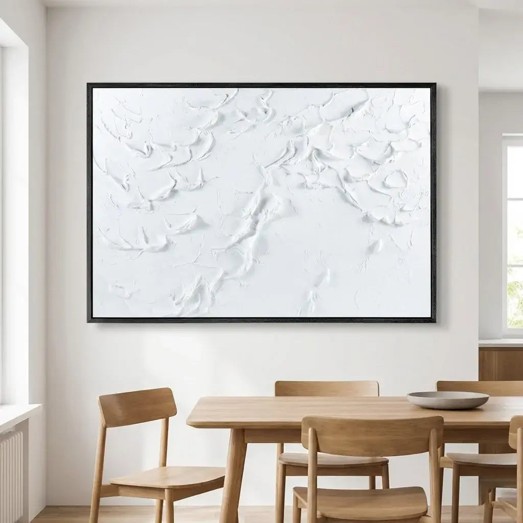 Dining room with a wooden table and chairs, and a large abstract painting on the wall.