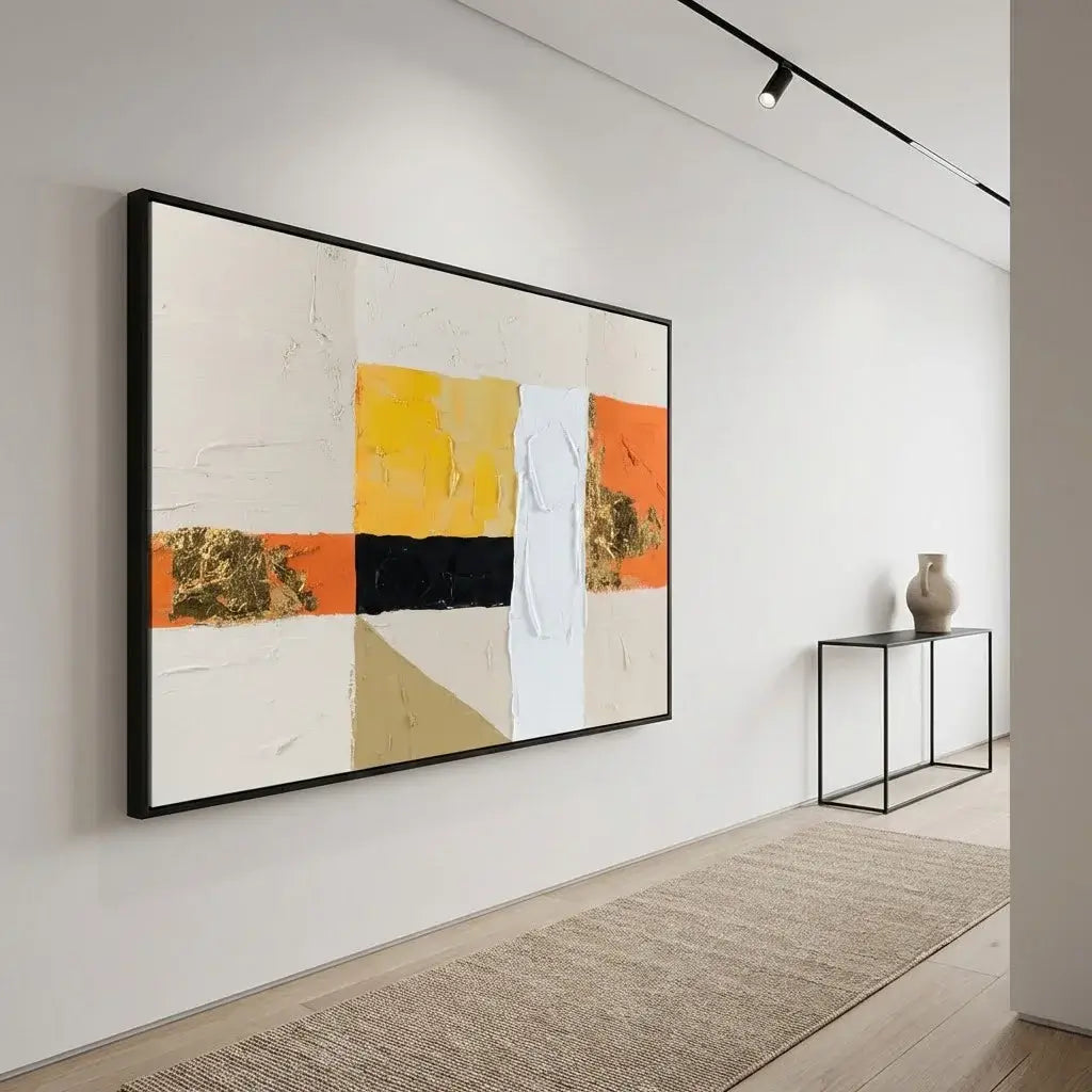 Abstract art piece on a wall in a modern interior setting