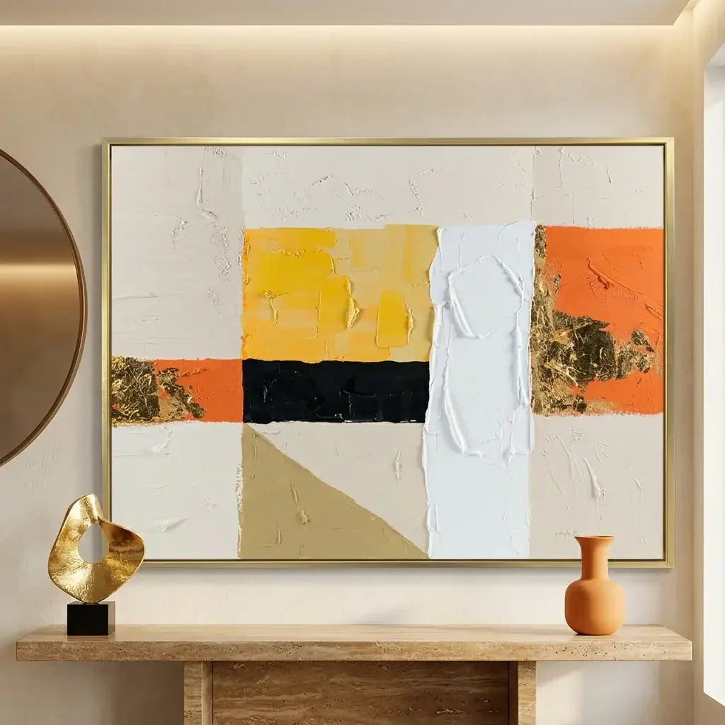 Modern living room with abstract art, wooden cabinet, and green armchair.