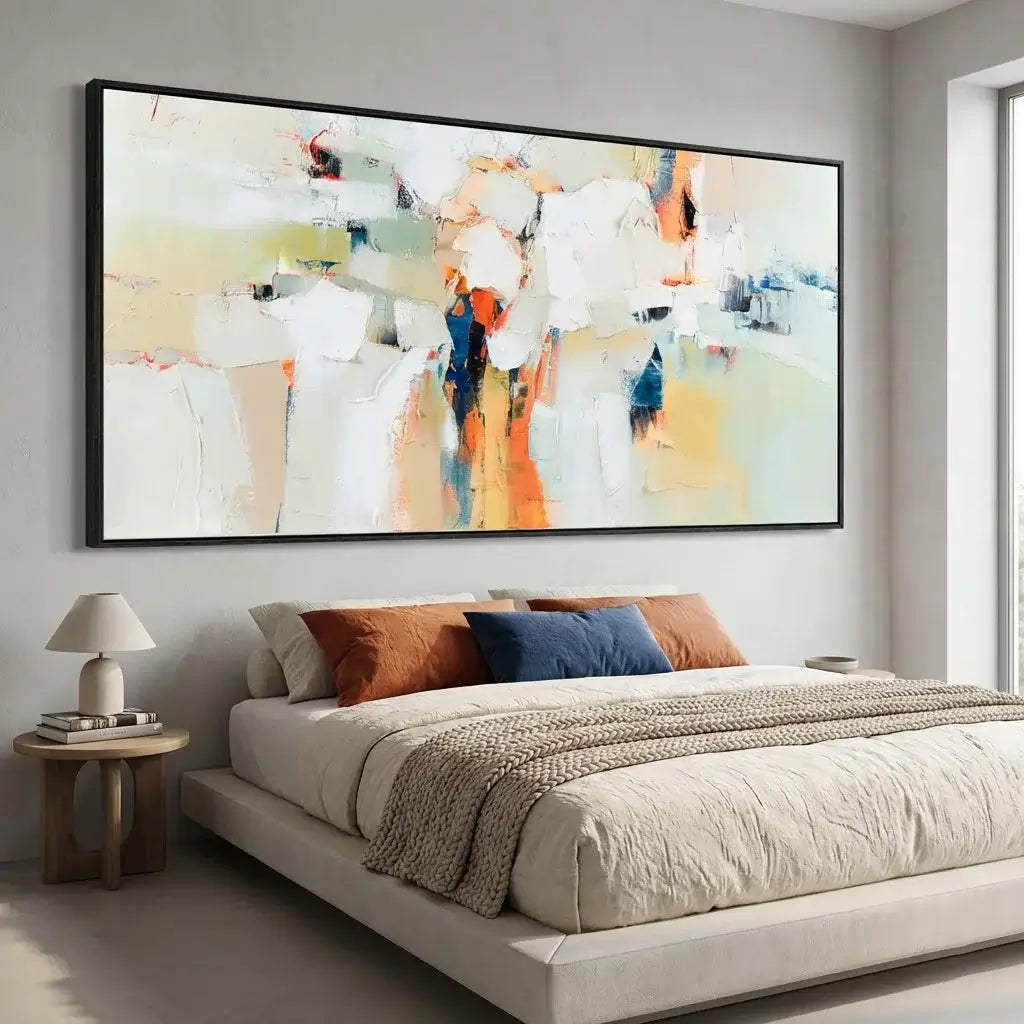 Modern bedroom with a large abstract painting above a bed.