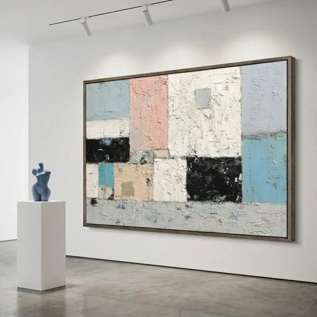 Abstract painting in a modern gallery setting with a sculpture on a pedestal.