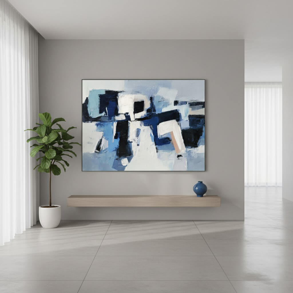 Abstract painting on a wall in a modern room with a plant and shelf.