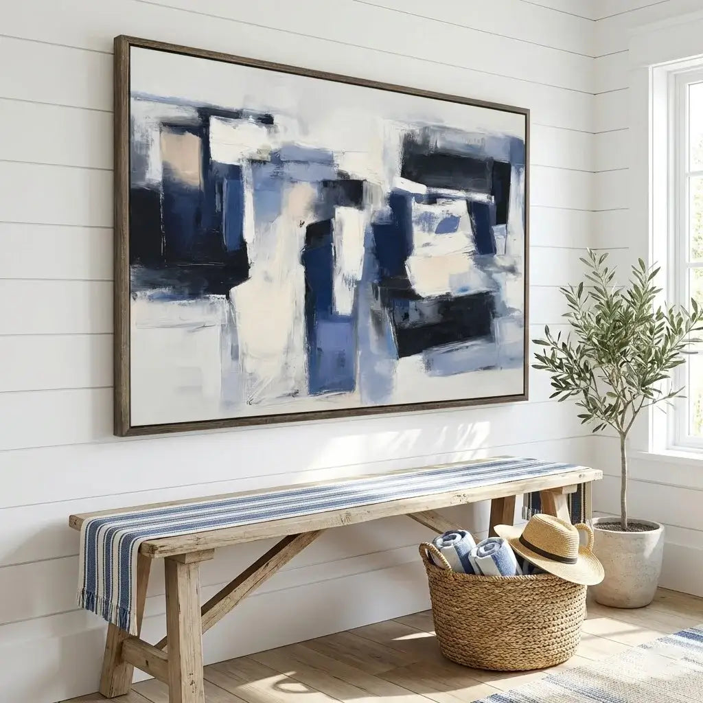 Living room with abstract painting, wooden bench, and plant