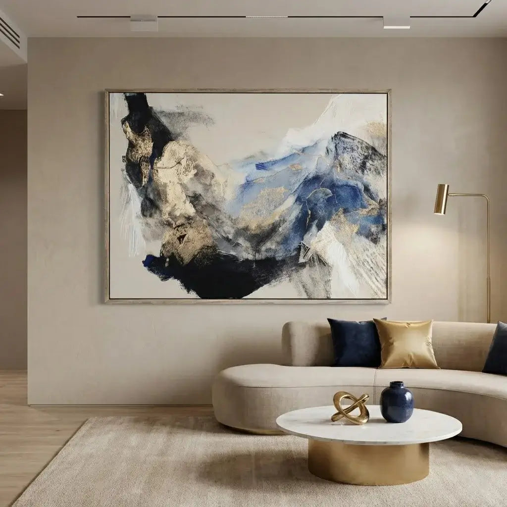 Modern living room with abstract painting on the wall and a sofa with decorative pillows.