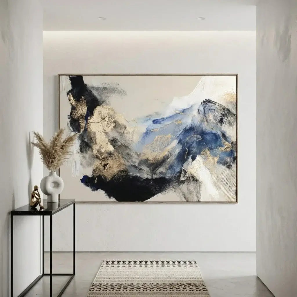 Abstract painting in a modern interior setting with a side table and decorative items.