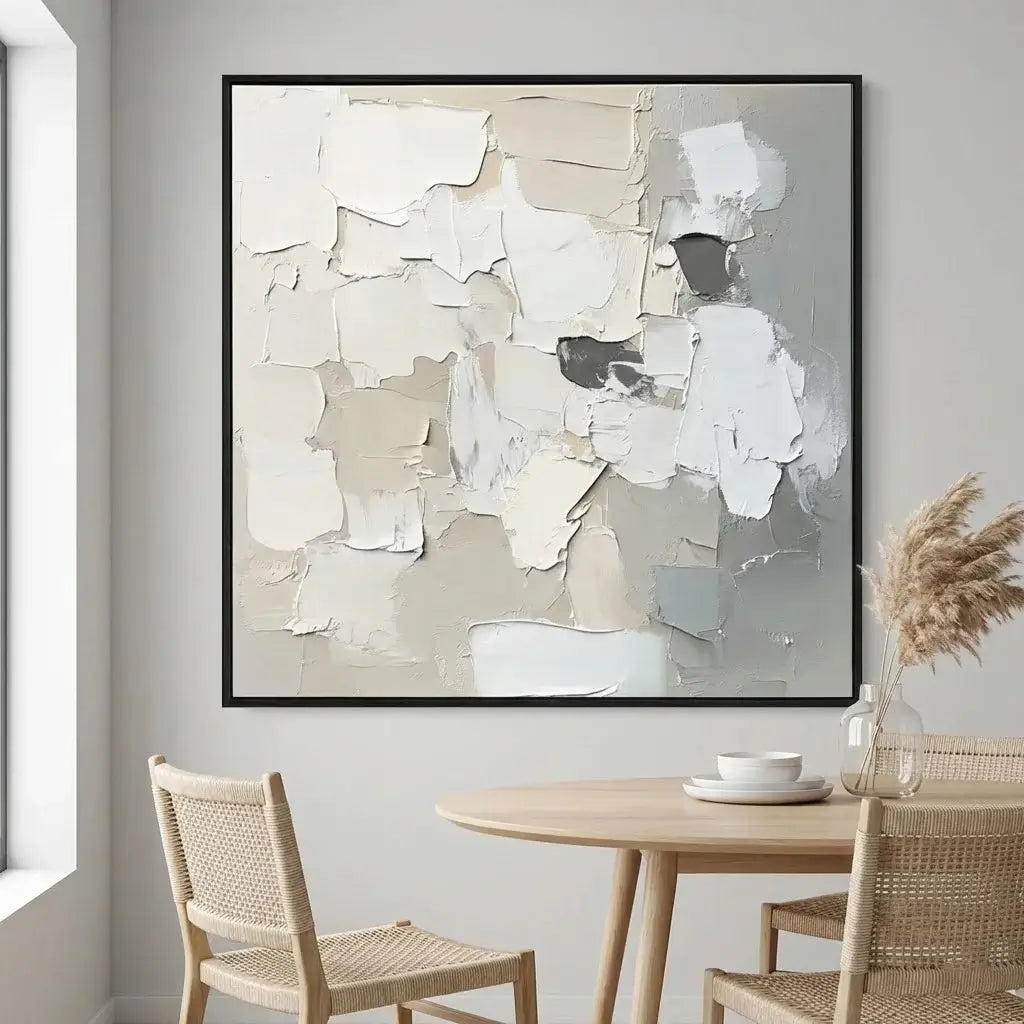 Abstract art piece in a modern dining room with neutral tones.