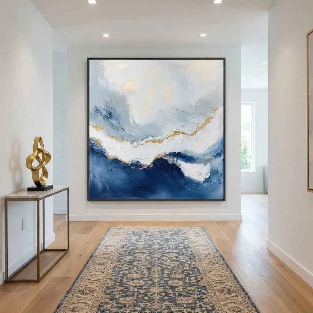 Modern interior with abstract art, sculpture, and patterned rug.