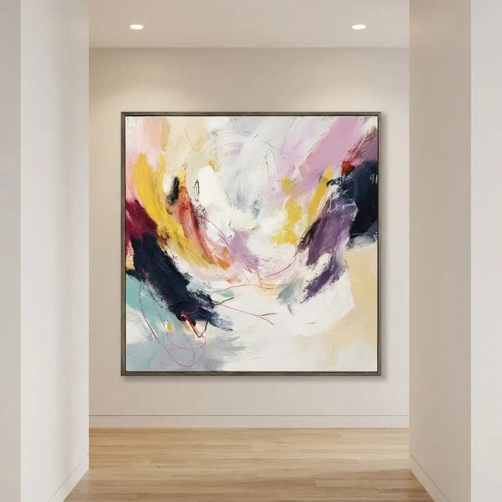 Abstract painting in a modern interior setting with neutral walls and wooden floor.