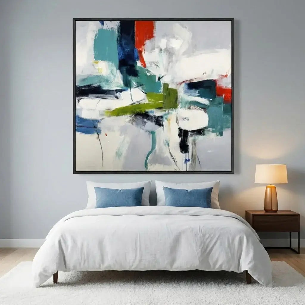 Abstract painting in a modern bedroom with a bed and nightstand.