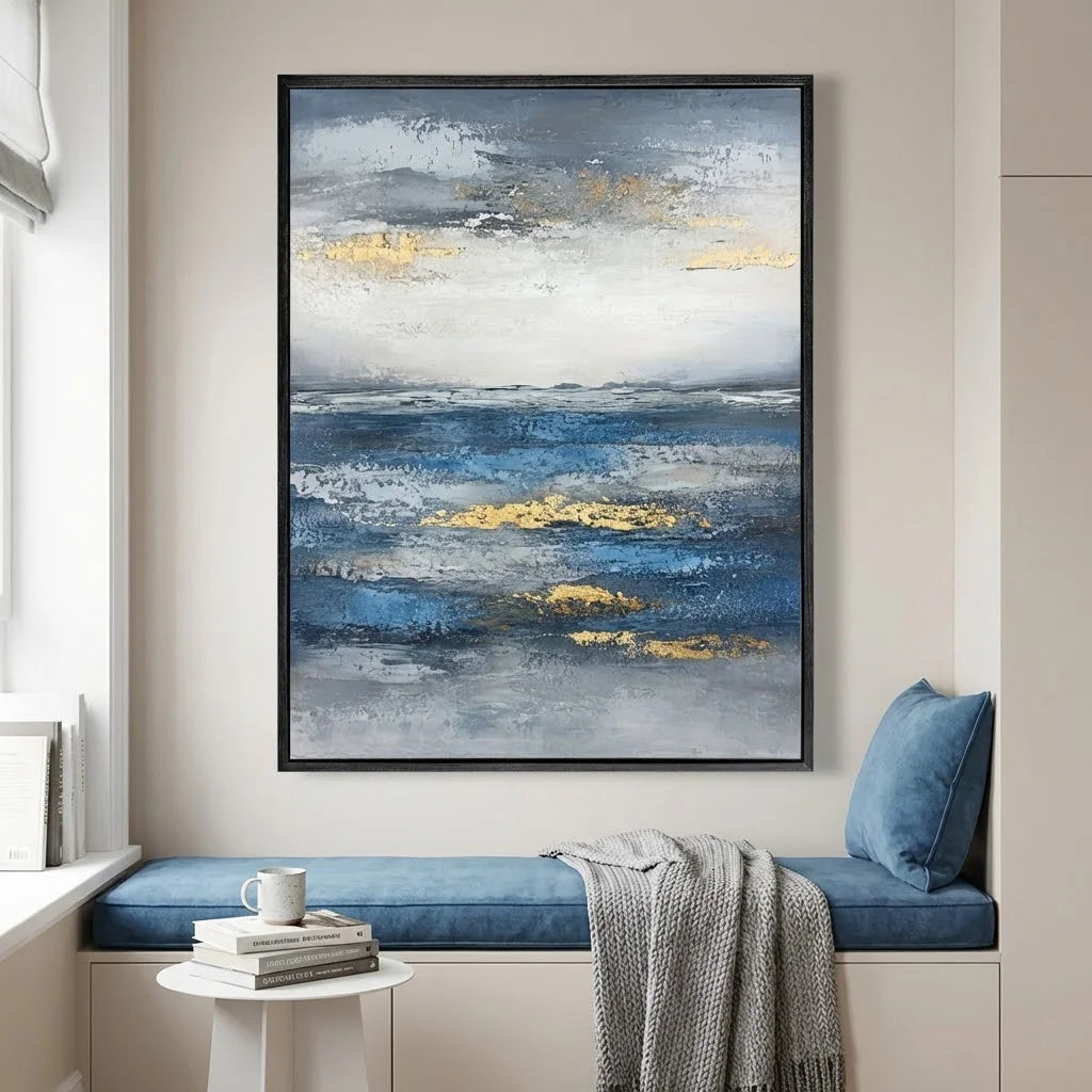 Abstract painting in a modern interior setting with a bench and cushions.