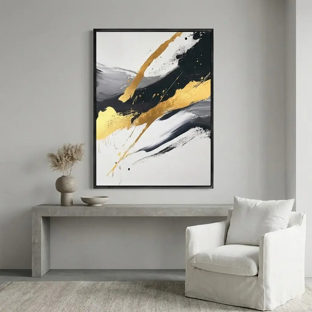 Modern interior with abstract art on the wall, a console table, and a chair.